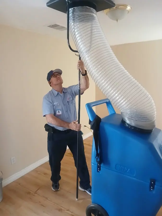 HVAC Installation technician using HEPA equipment in Hercules